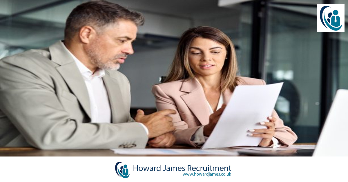 A business leader looking at a shortlist of candidatesfrom Howard james Recruitment A business leader looking at a shortlist of candidatesfrom Howard james Recruitment