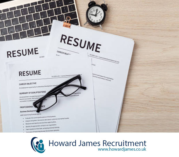 A hiring manager looking at a near-empty stack of CVs A hiring manager looking at a near-empty stack of CVs