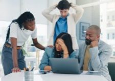 Woman, stress and crisis with team, laptop and stock market trading with support for mistake at office. Person, computer and sad with 404 glitch, error and lost profit with group at investment agency