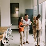 Young multiethnic startup team working at the modern office