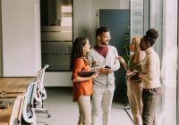 Young multiethnic startup team working at the modern office